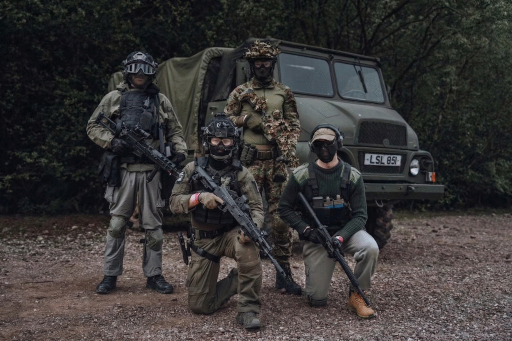 Group of airsoft players with a Jeep at The Kingdom woodland airsoft site, Staffordshire