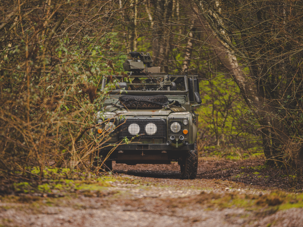 Airsoft players with a military vehicle at The Kingdom airsoft venue