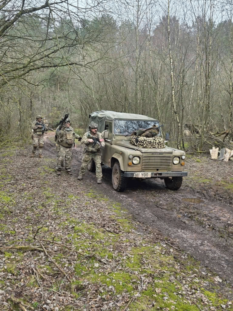 Milsim airsoft players with a Land Rover at The Kingdom