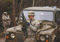 Airsoft player with an M249 at The Kingdom