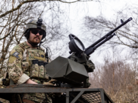 Airsoft machine gunner at The Kingdom