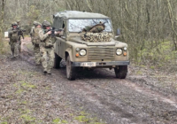 Airsoft players with a Land Rover at The Kingdom